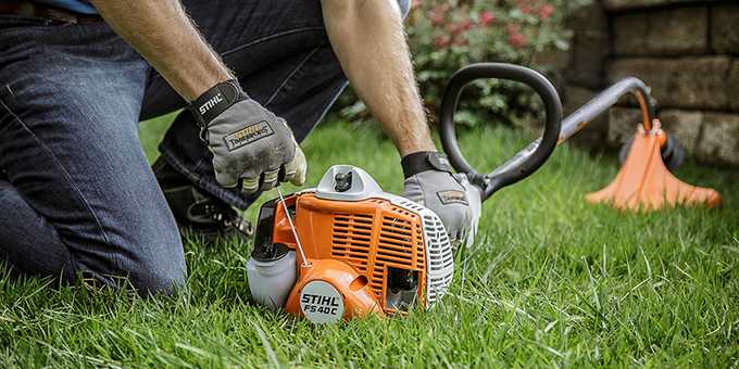 Man starting a STIHL trimmer with Easy2Start technology