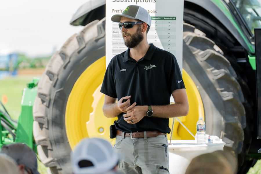 Hutson employee giving a presentation at the Field Day event.