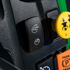 Electric One-Touch MulchControl switch on a John Deere lawn tractor